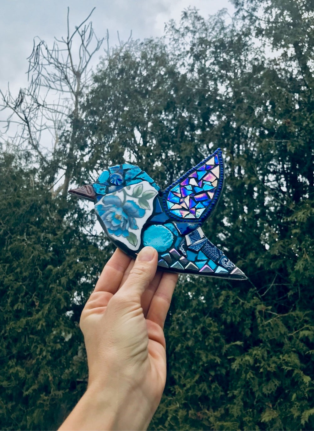 mosaic bird with blue hues