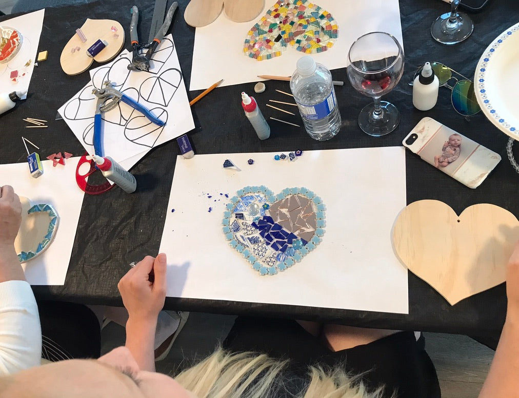 Example of a mosaic art workshop using the heart shape. Each participant had a chance to create a unique mosaic heart