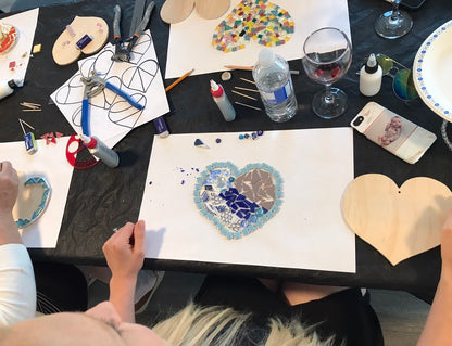 Example of a mosaic art workshop using the heart shape. Each participant had a chance to create a unique mosaic heart
